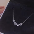 Load and play video in Gallery viewer, Hearts Flower Pendant Necklace